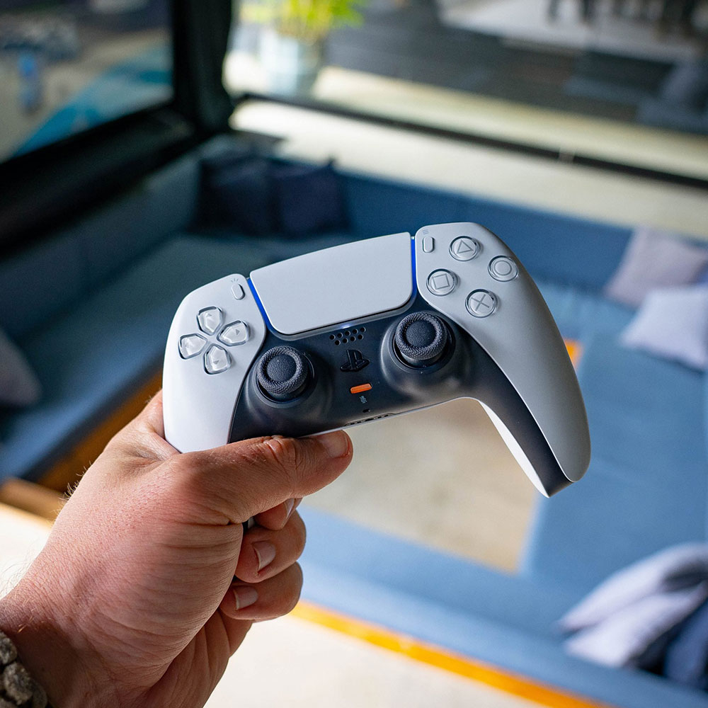 کنسول بازی سونی مدل PlayStation 5 ظرفیت 825 گیگابایت ریجن 1200 آسیا به همراه دسته اضافی و پایه شارژر و بازی FIFA 23